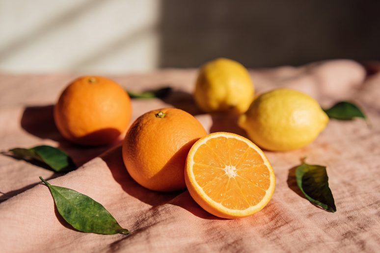 Oranges and lemons on linen